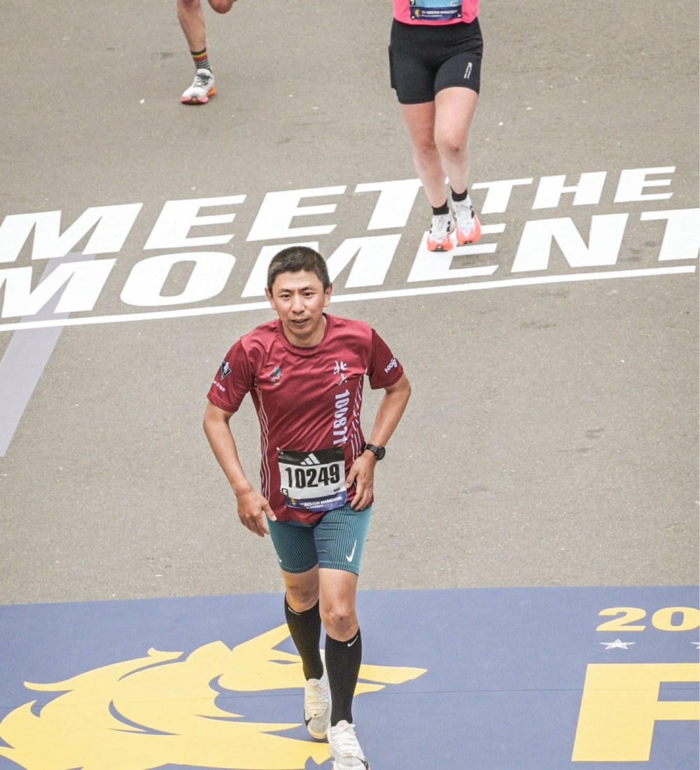 Chong Wang running the Boston Marathon